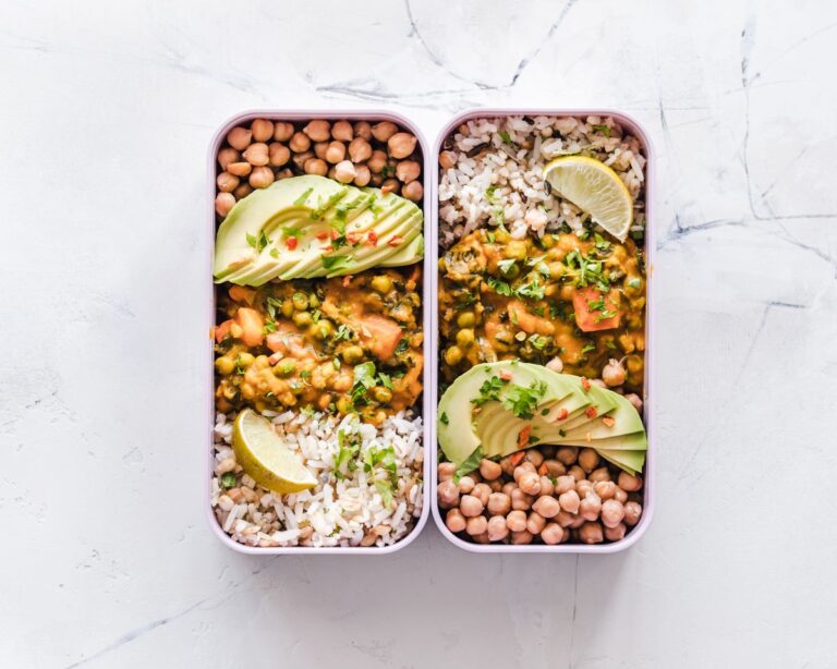 How to Eat on $200 a Month in 2026 — Proven Meal Plan Included how to eat on 200 a month — budget grocery staples flat lay